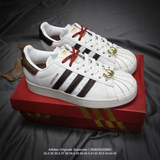 Sneakers—low-top casual sneakers; stylish, comfortable, lace-up walking shoes.