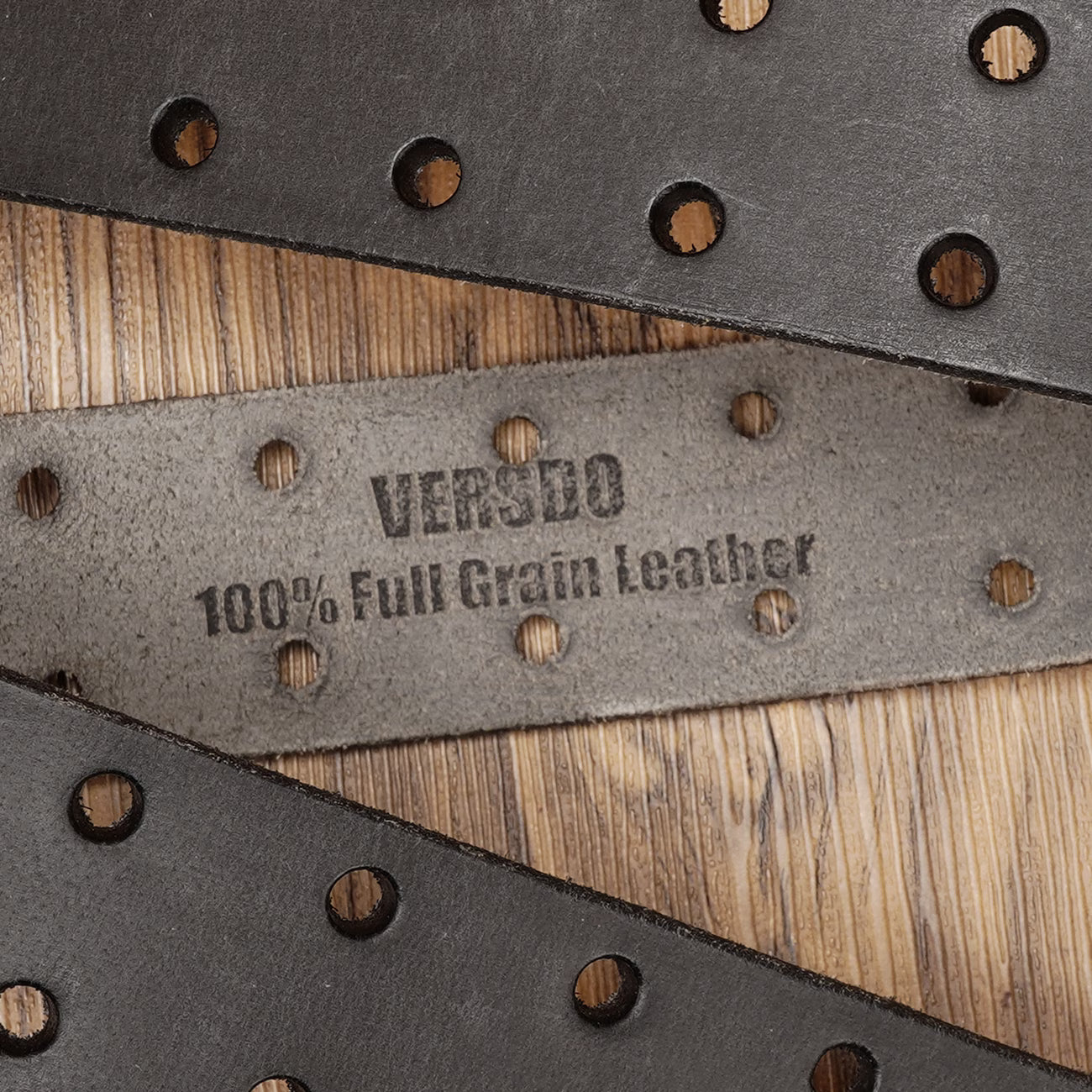 Crafted from full-grain cowhide, featuring a classic brass buckle.