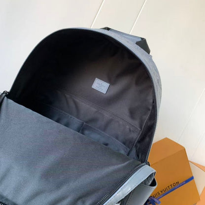 Grey embossed cowhide backpack, featuring metal hardware that exudes a refined, understated air.